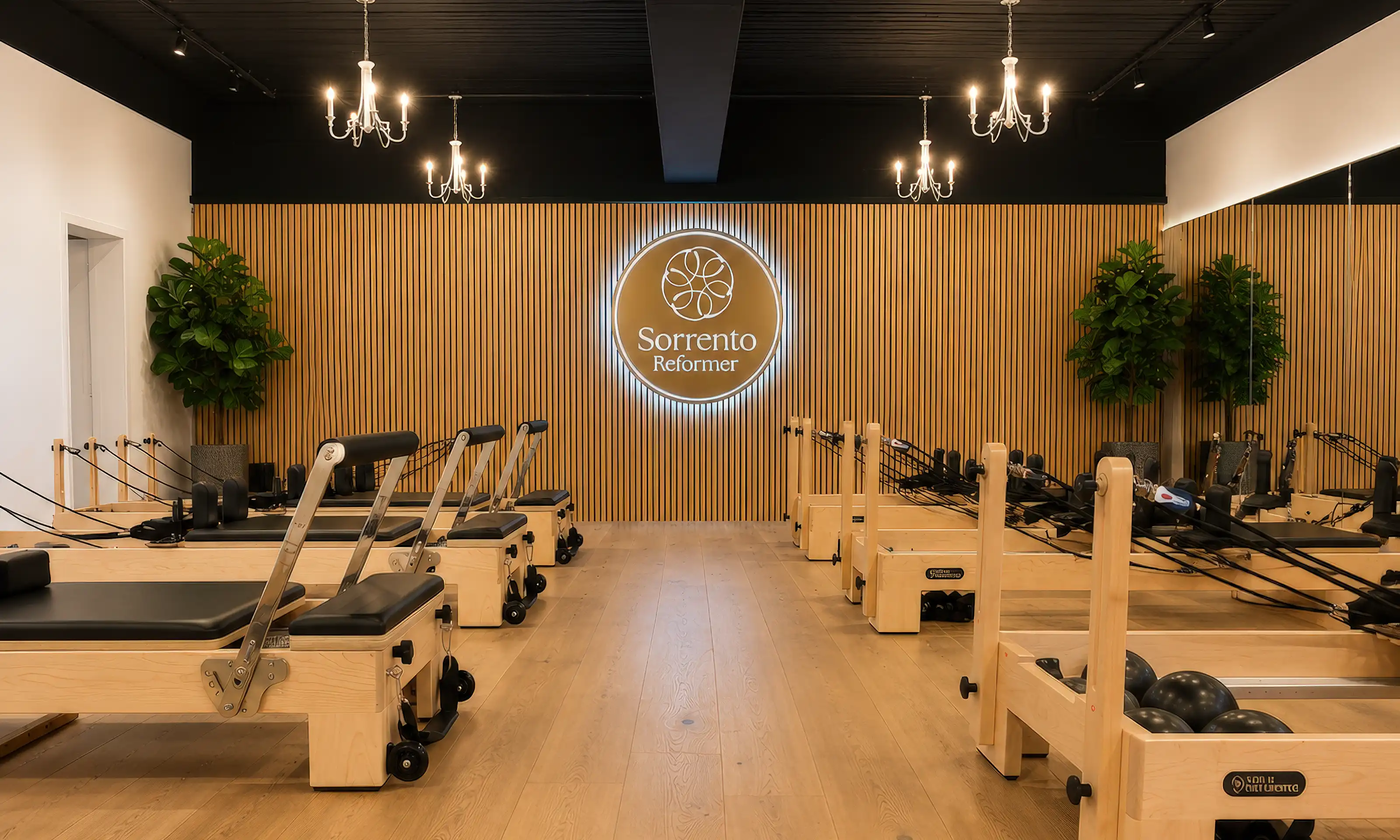 Woman practicing Reformer Pilates at Sorrento Reformer studio